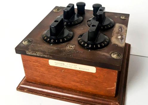 Resistance box with 4 rotary switches with two 0-9 measurements; enclosed in a Bakelite case with solid nickel switch studs. 